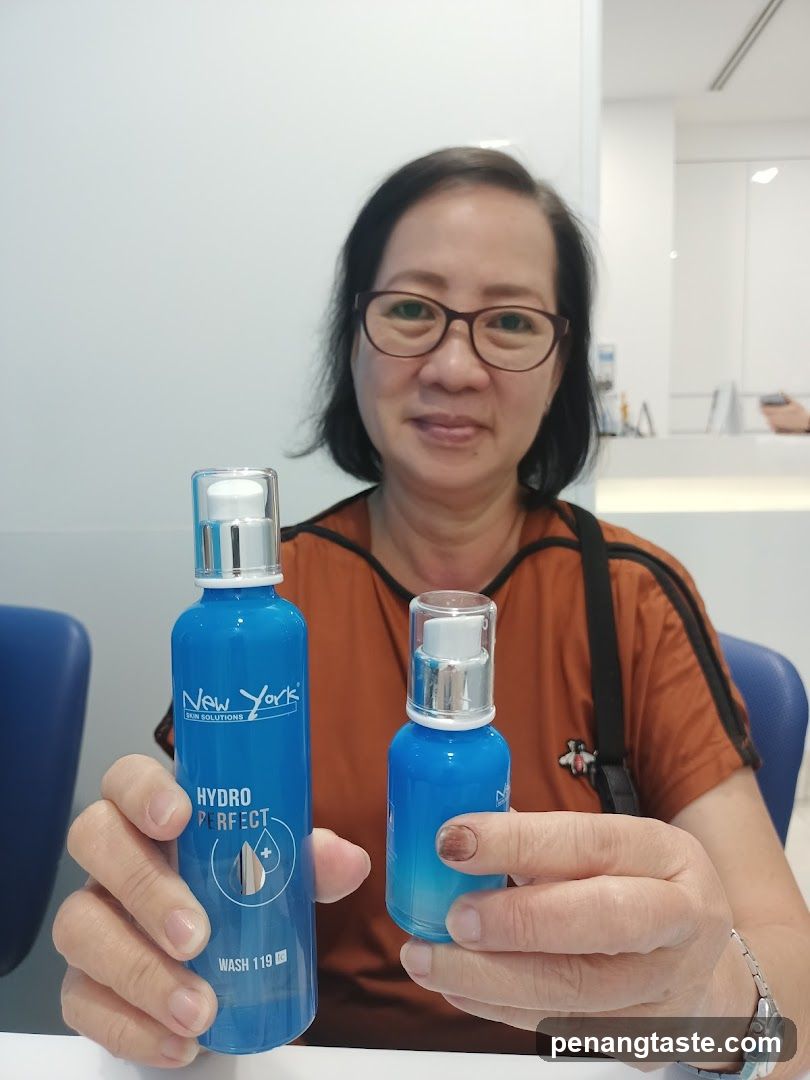 Woman holding skincare products