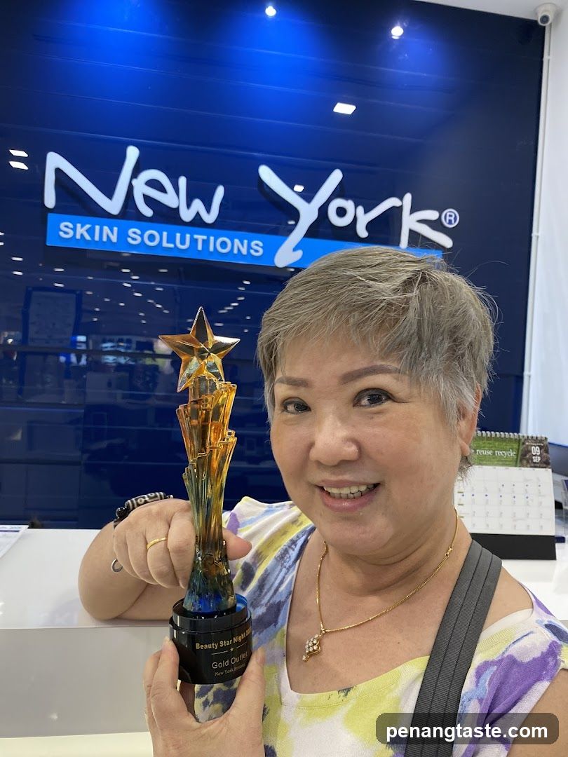 Woman holding trophy in store