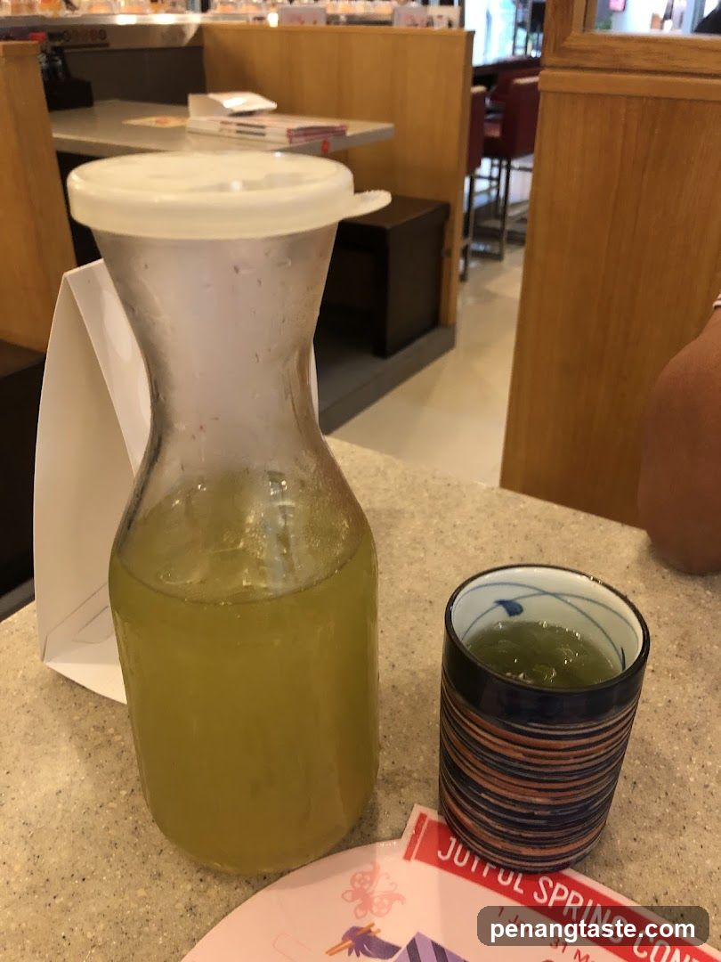 Beverage Pitcher and Cup on Counter