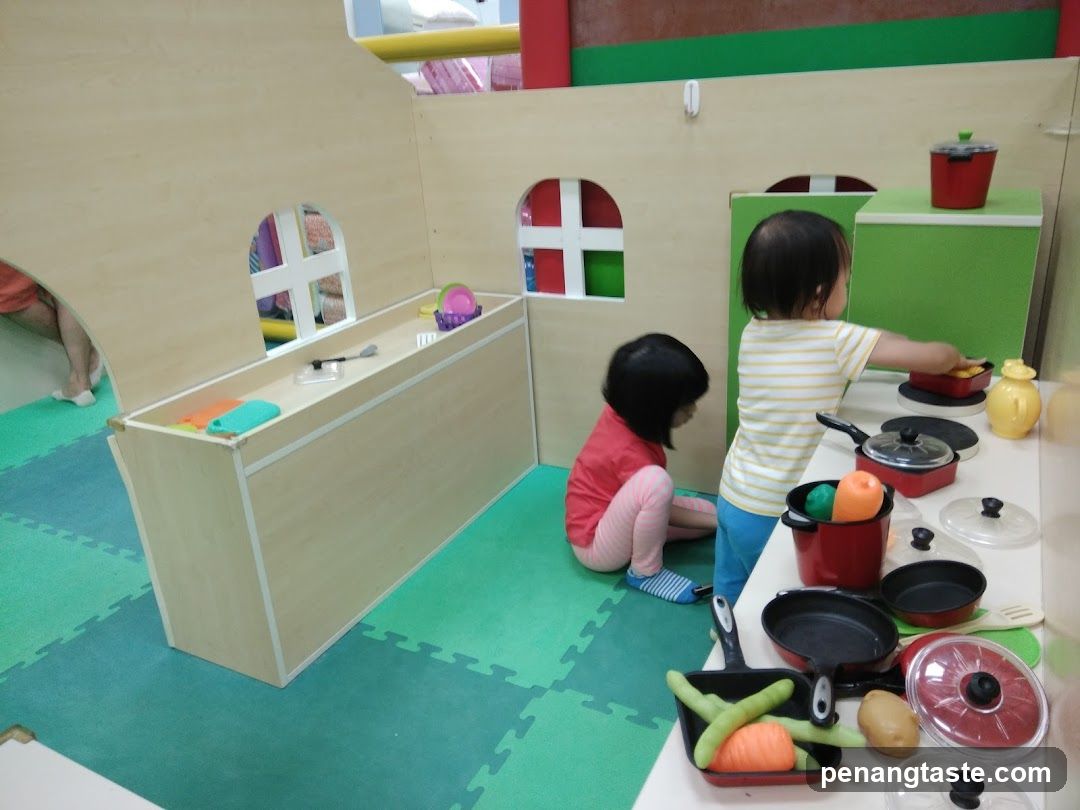 Children Playing with Toy Kitchen