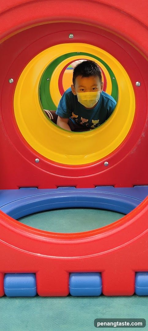 Child in Play Tunnel