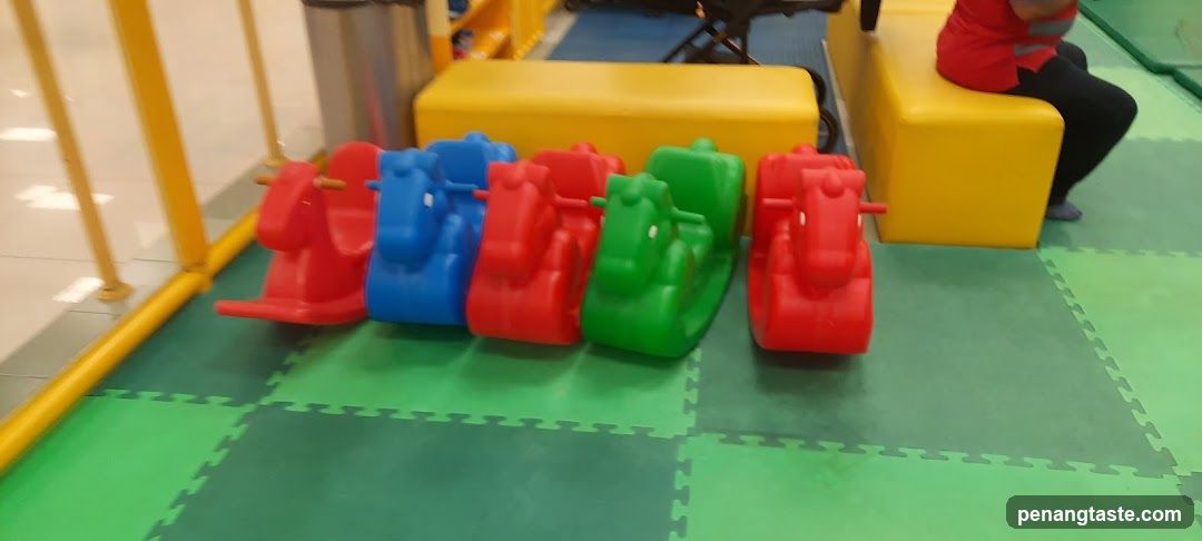 Colorful Plastic Horses in Play Area