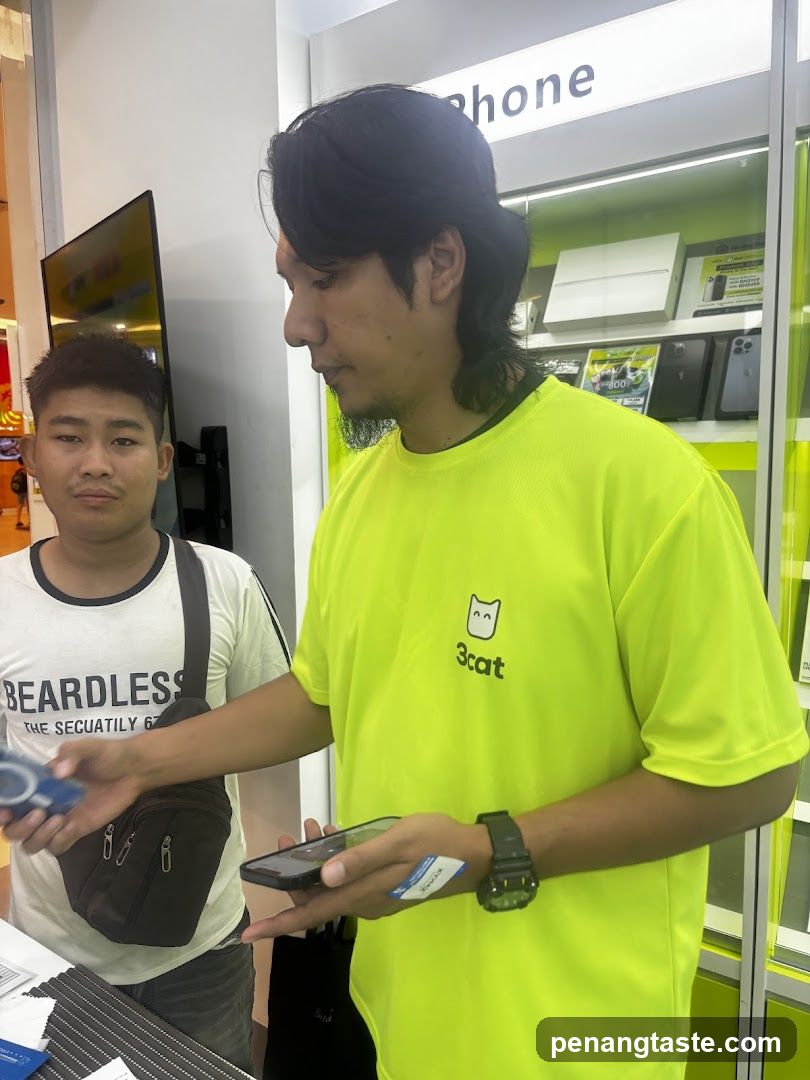 Phone Store Interior with Staff and Customer