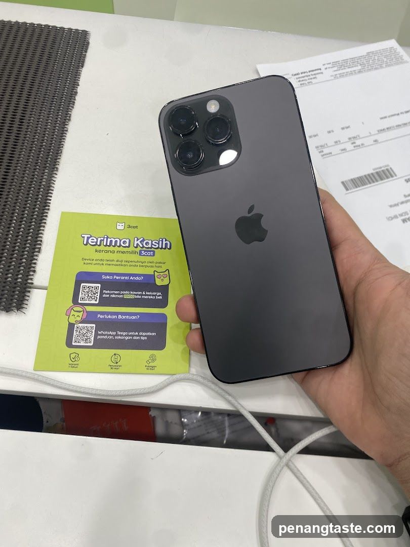 iPhone on counter with receipt and card