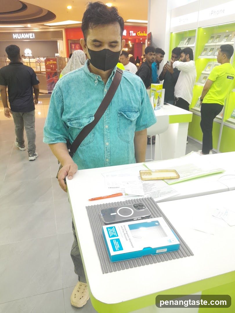 Customer at Electronics Store Counter