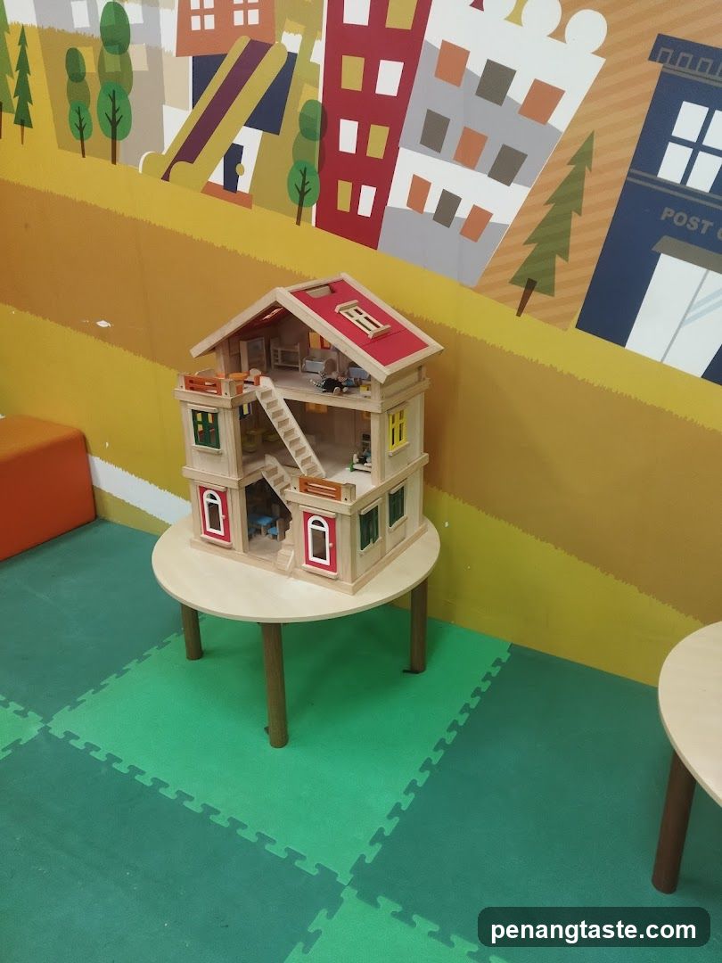 Wooden Dollhouse on Table