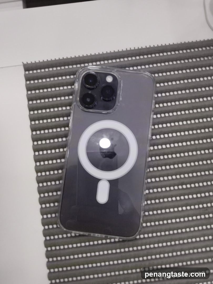 iPhone with MagSafe case on textured mat