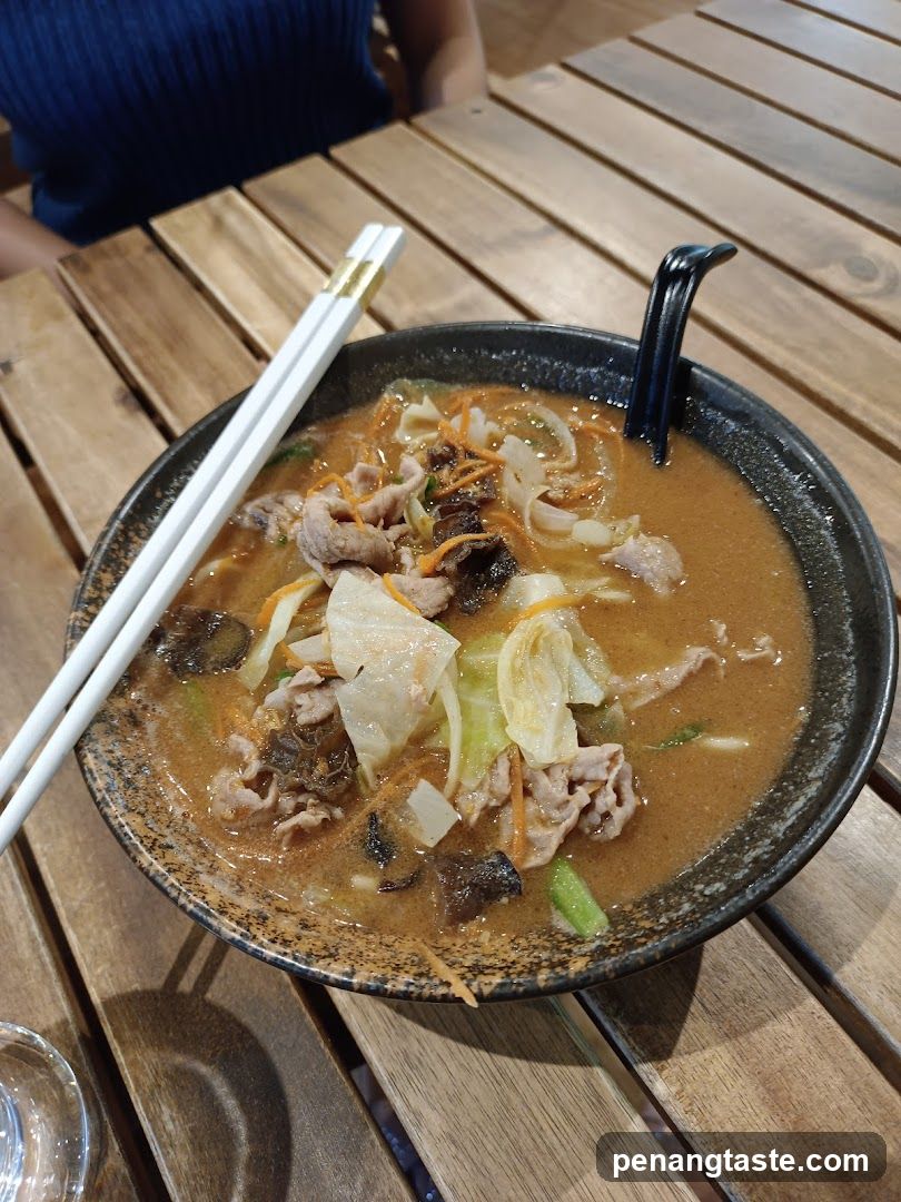 Bowl of Noodle Soup with Chopsticks
