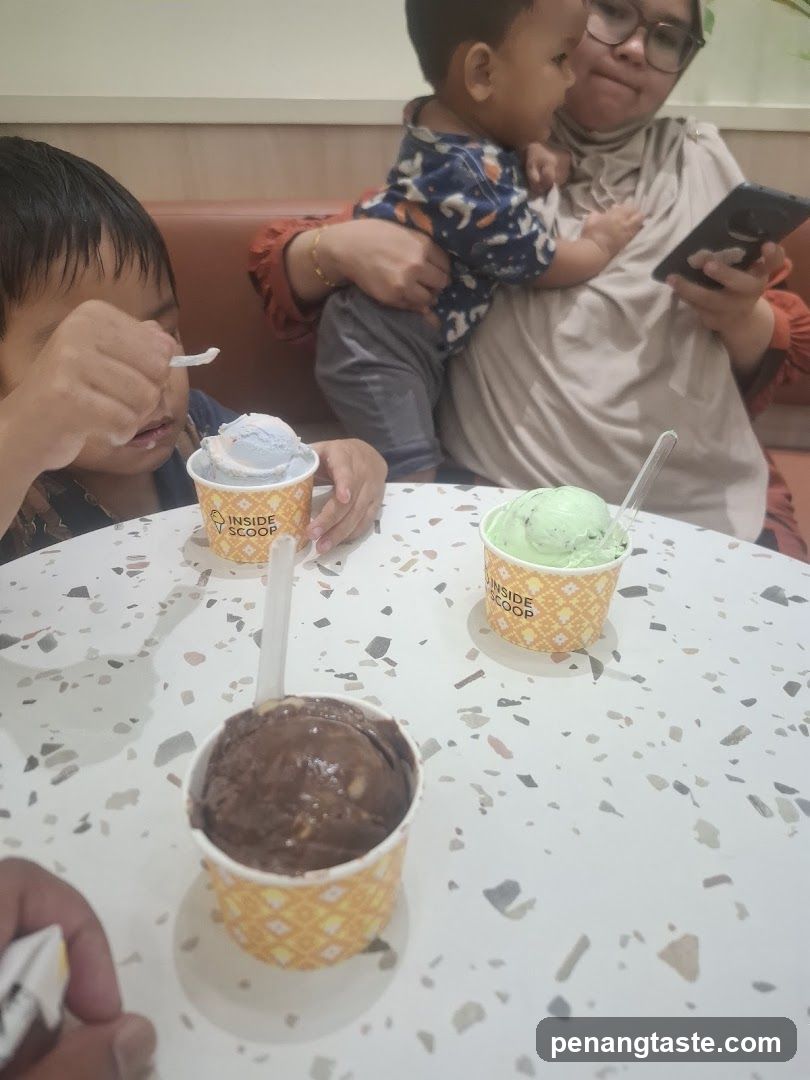 Family enjoying ice cream at Inside Scoop