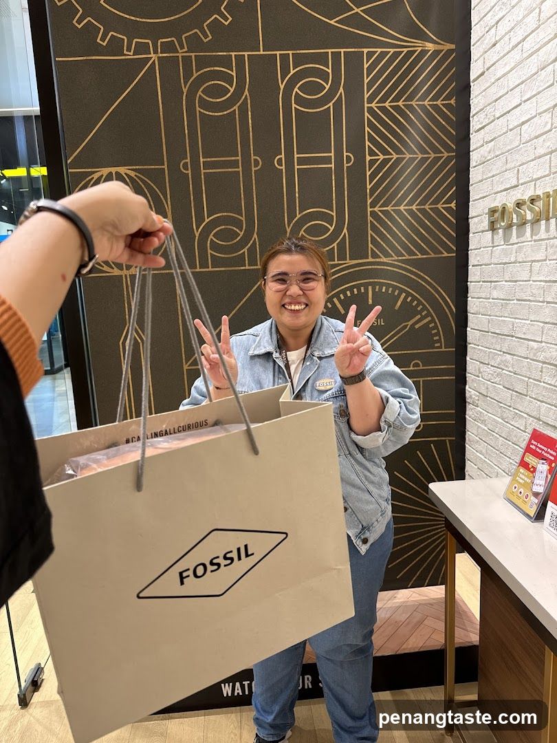 Fossil Store Interior with Shopping Bag