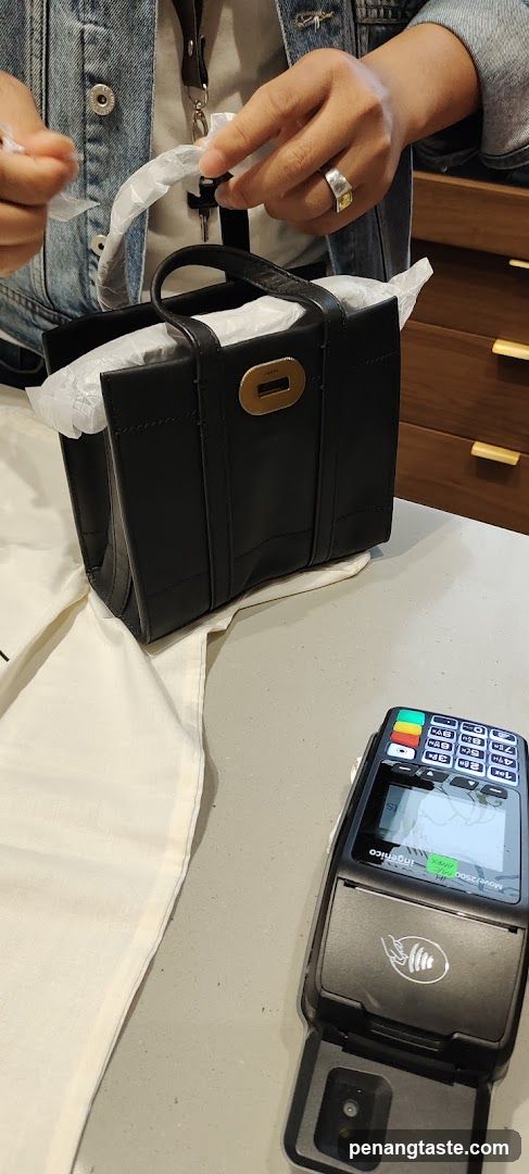Black Handbag at Counter