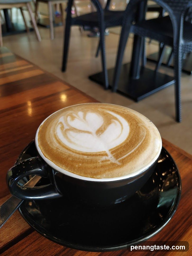 Latte Art Coffee in Cafe Interior