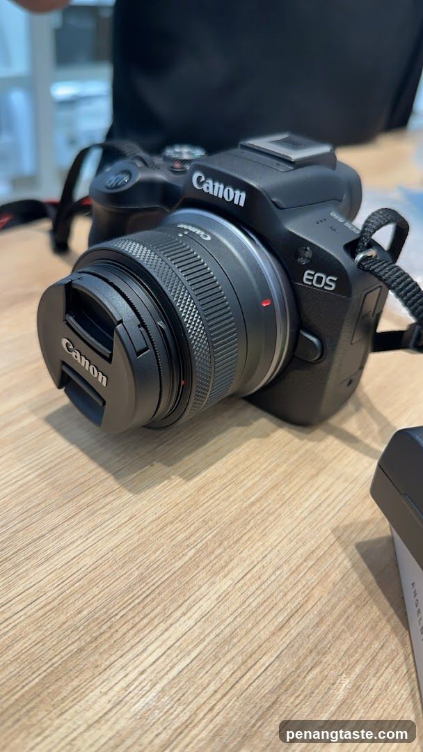 Canon Camera on Wooden Table