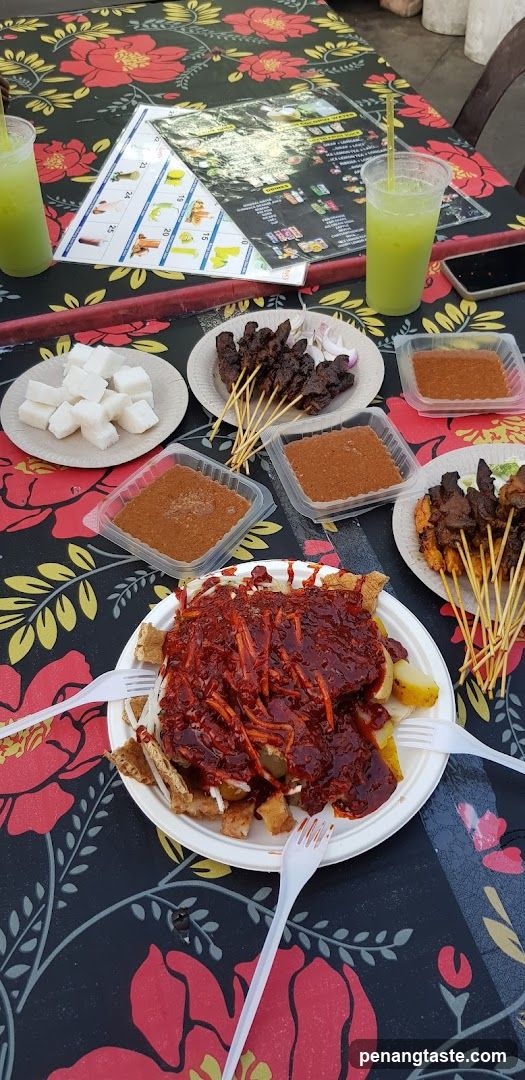 Food Spread on Floral Tablecloth
