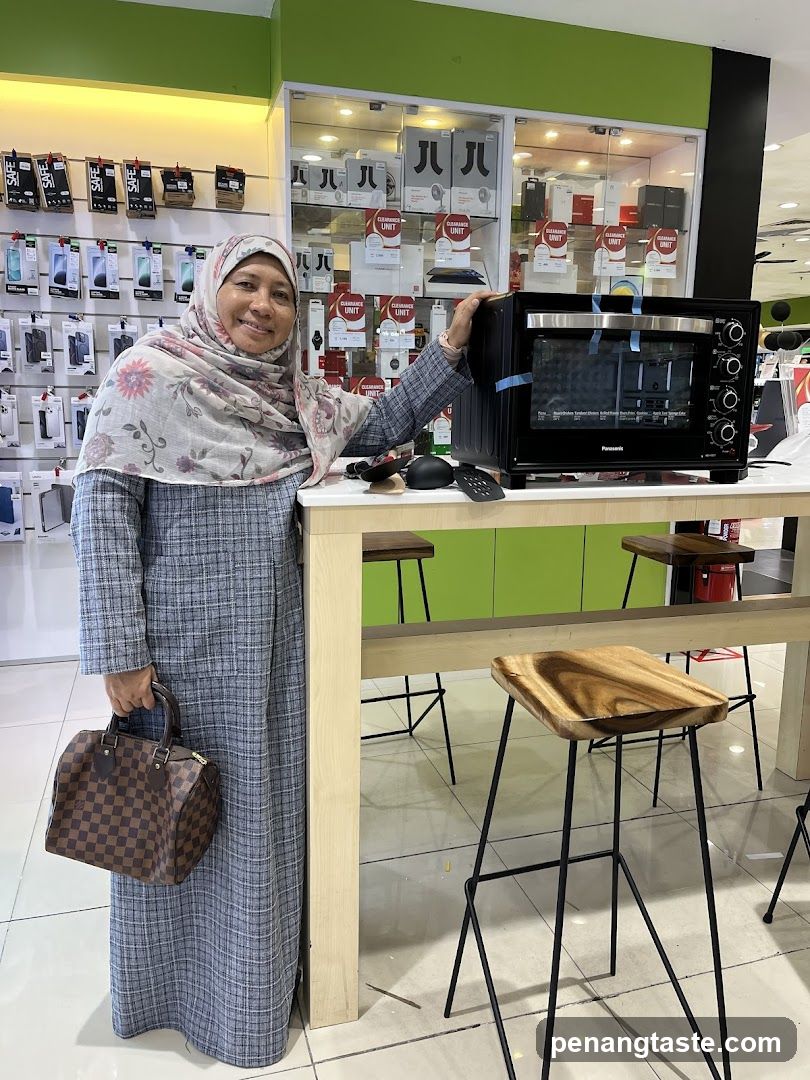 Woman with Panasonic Oven in Store