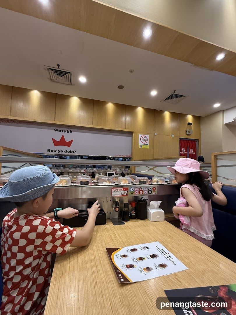 Sushi Restaurant Interior with Children