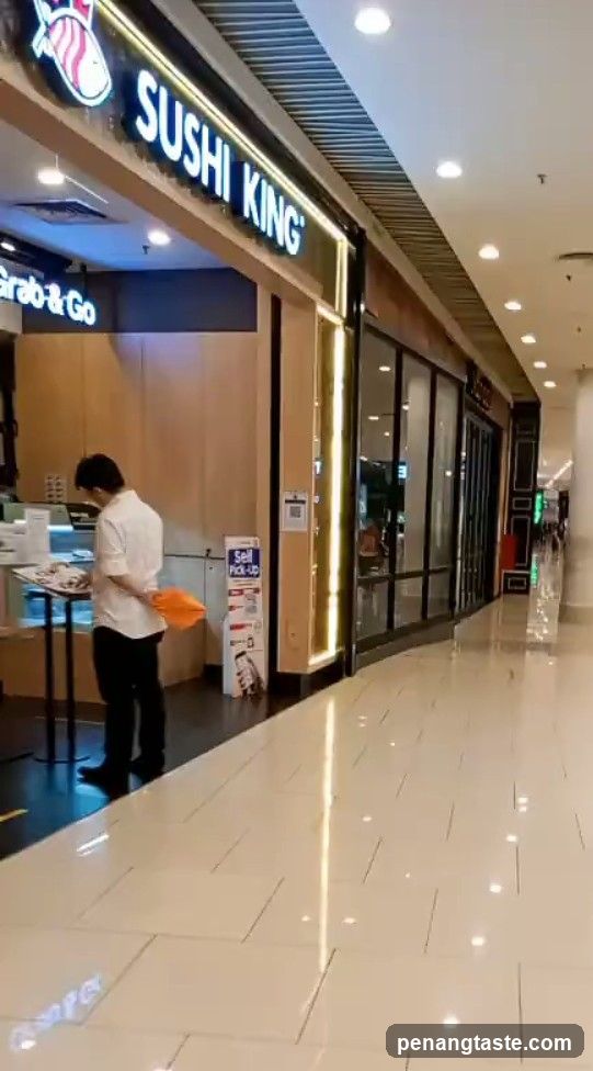 Sushi King Storefront with Staff
