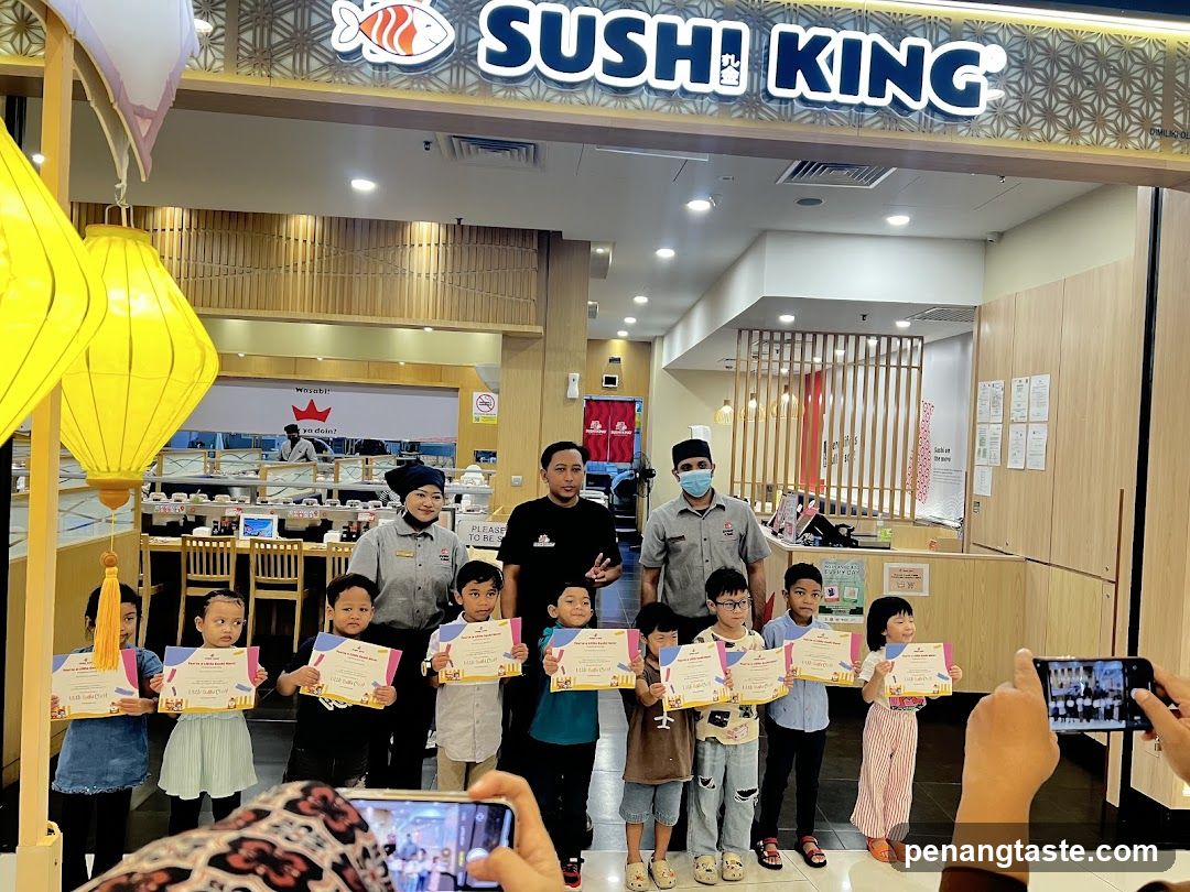 Sushi King Store Interior with Children and Staff