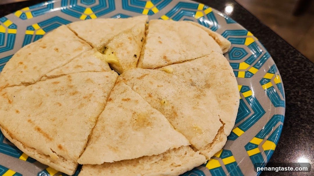 Fried Pizza on Patterned Plate