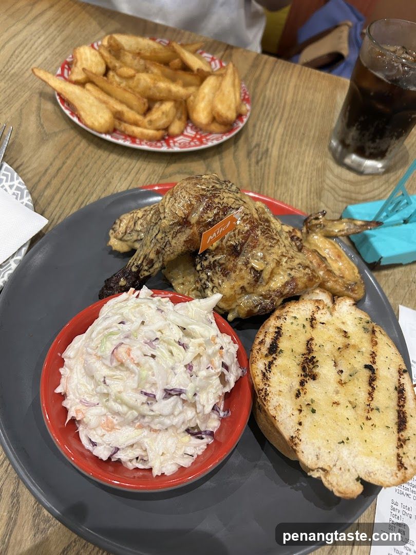 Roast Chicken Meal with Coleslaw and Fries