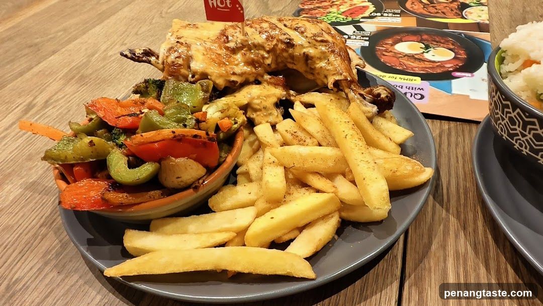 Grilled Chicken Meal with Fries and Vegetables