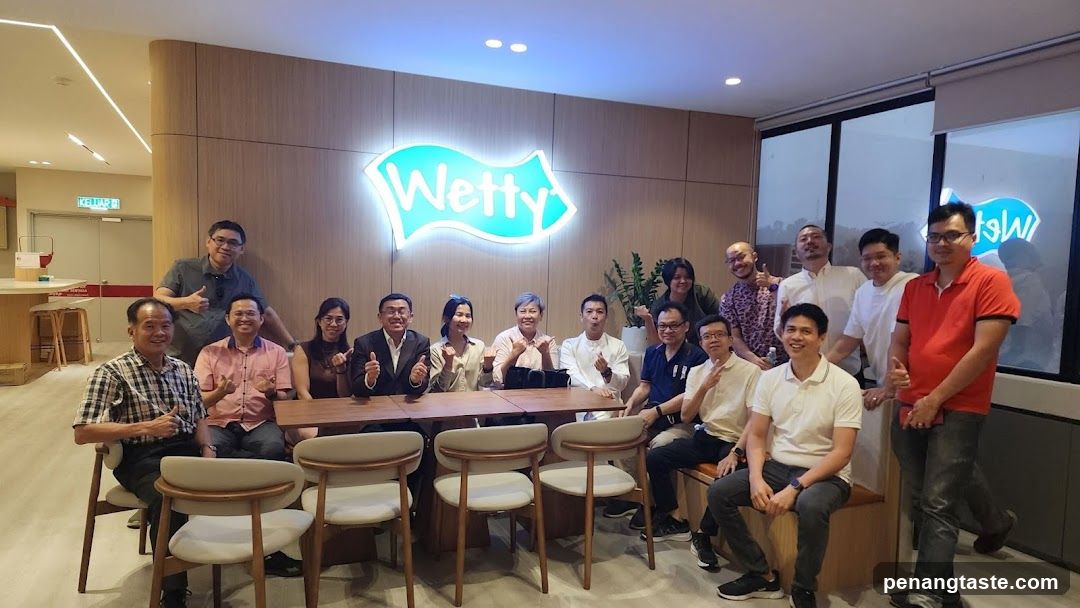 Group photo in Wetty office or cafe interior