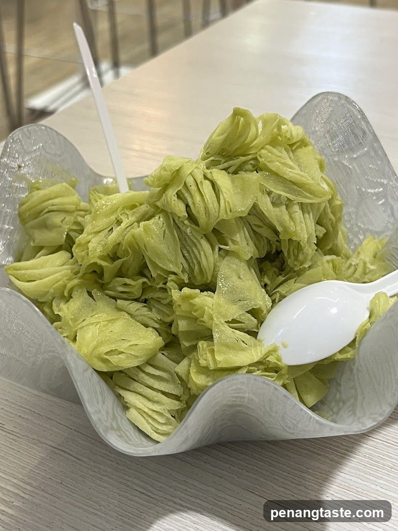 Green Leafy Dish in Glass Bowl