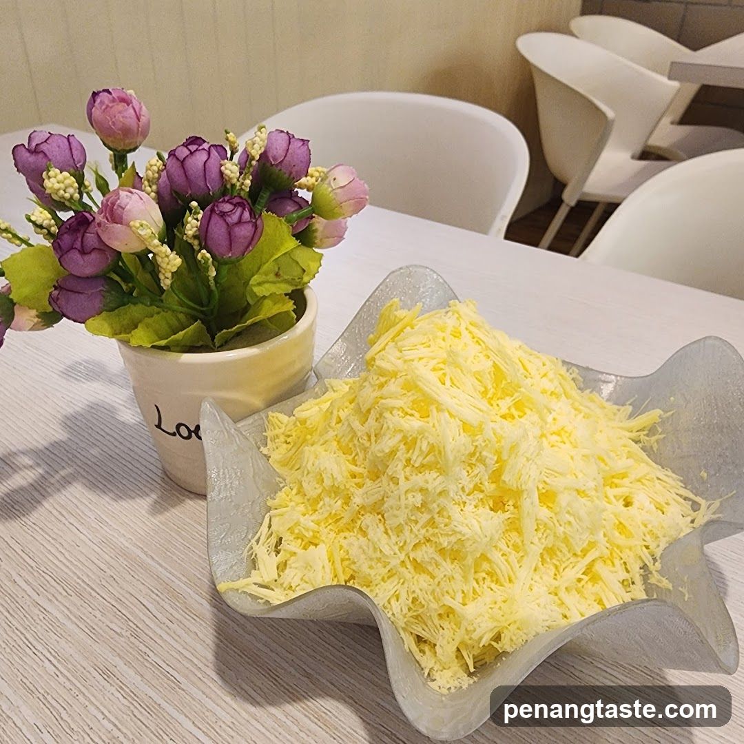 Shredded Cheese and Flowers on Table