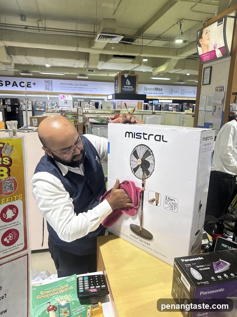 Electronics Store Interior with Staff