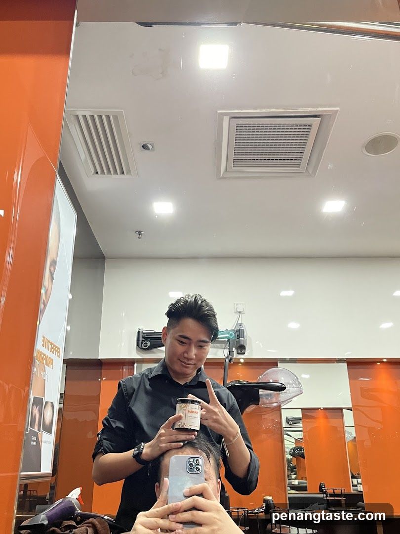 Hair Stylist Applying Product in Salon