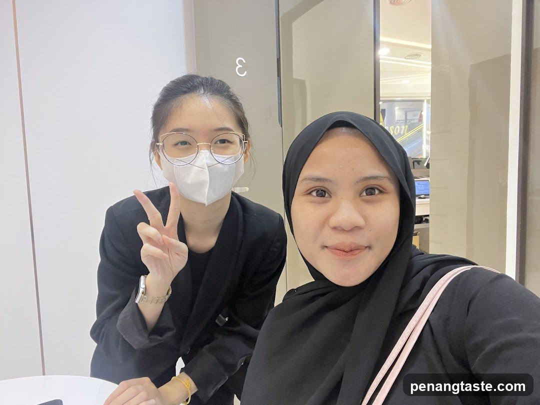 Two women taking a selfie indoors