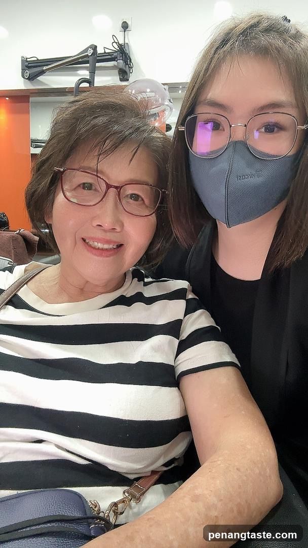 Two women posing together indoors