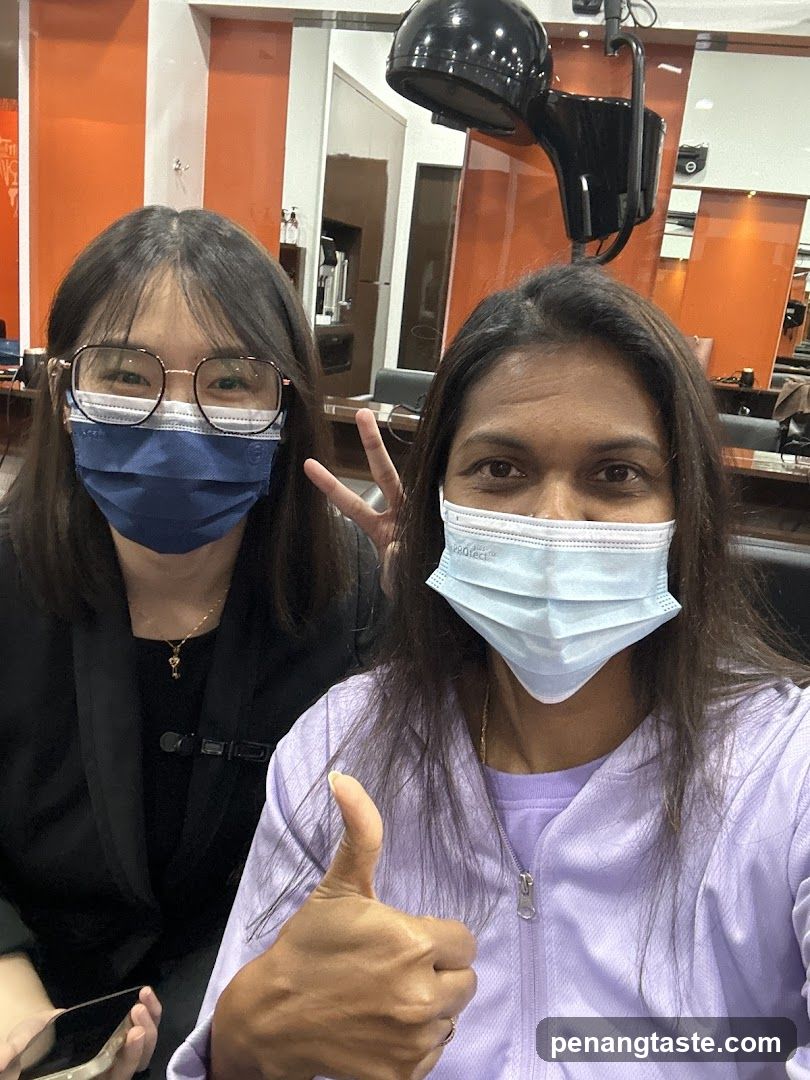 Hair Salon Interior with Staff and Customer