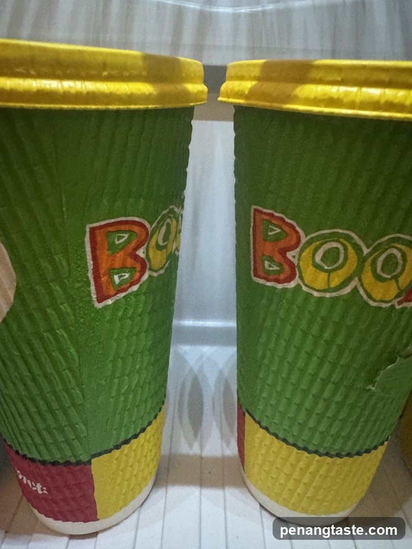 Green and Yellow Cups with 'BOO' Text