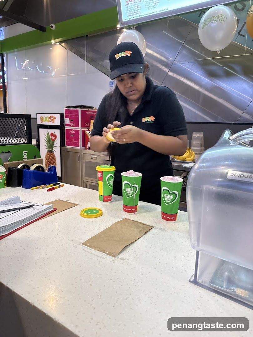Staff preparing drinks at counter