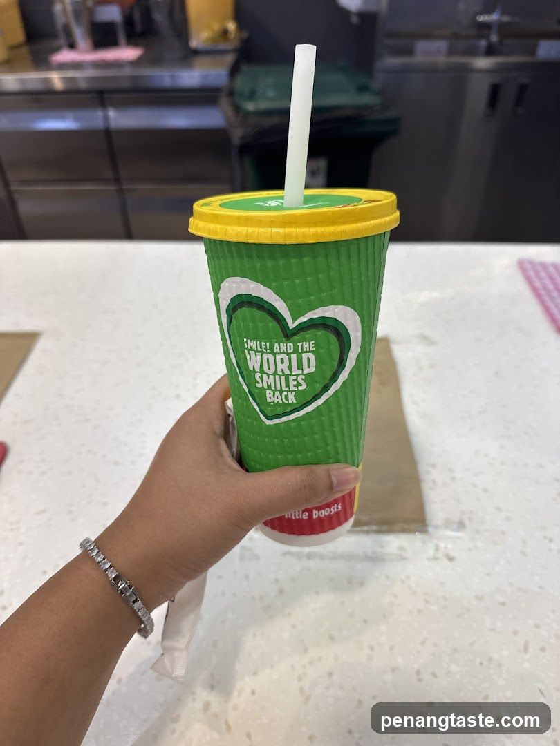 Green Cup with Heart Design