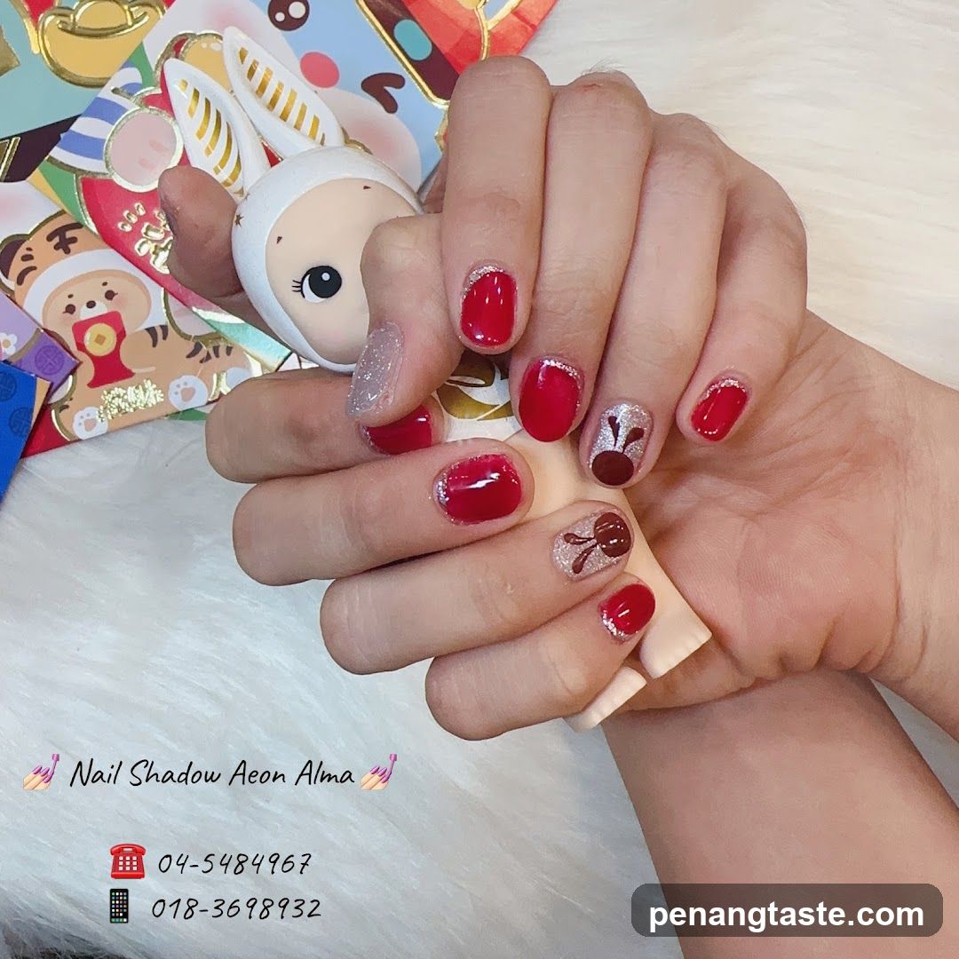 Nail Art Display with Red and Sparkle Design