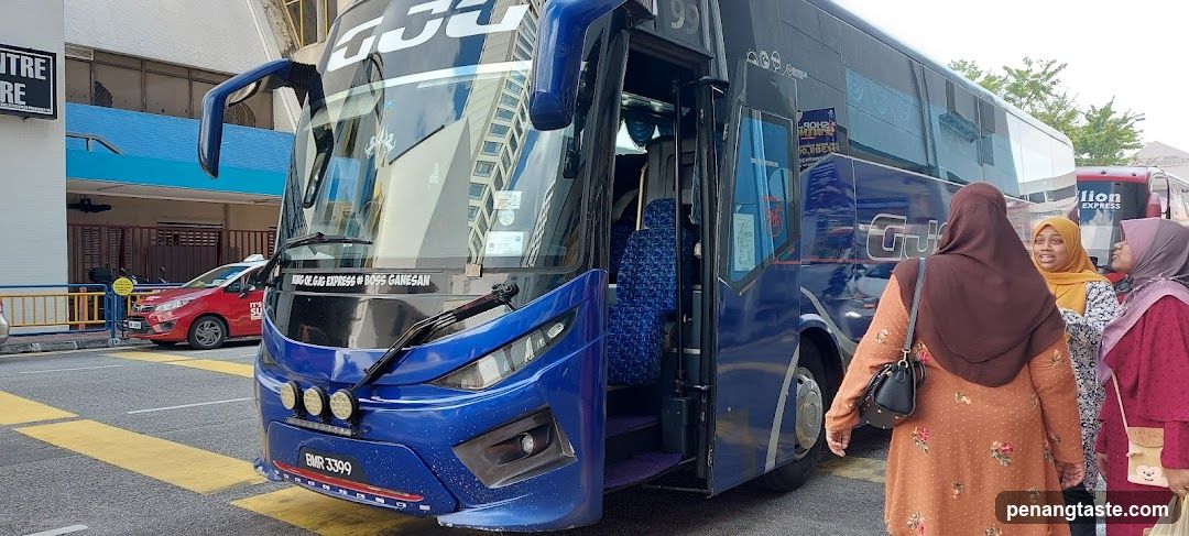 Blue Bus with Passengers Boarding