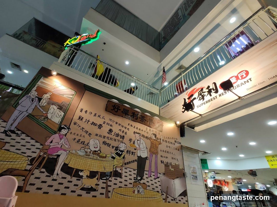 Interior of a restaurant with mural and signage