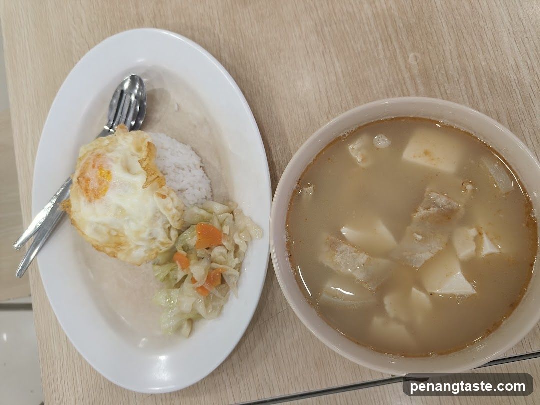 Meal with Fried Egg and Soup