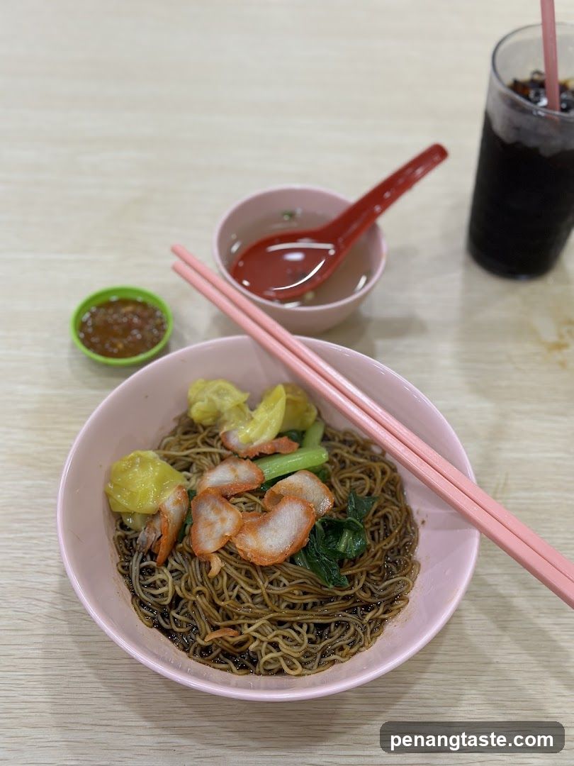 Noodle Bowl with Chopsticks and Condiments