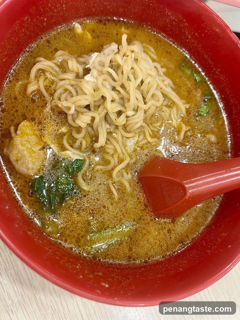 Bowl of Instant Noodles with Broth and Vegetables