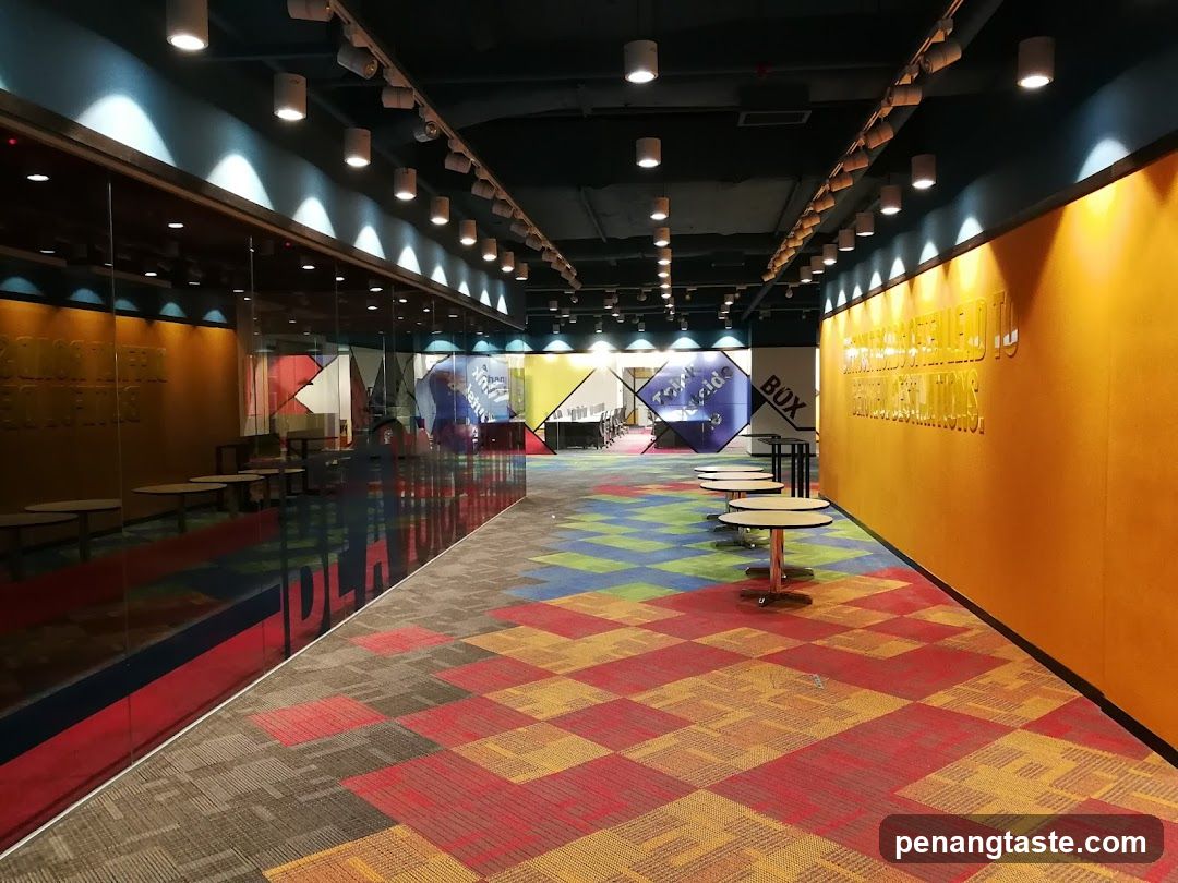 Colorful Interior Space with Glass Partition and Seating Area