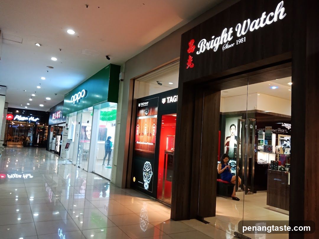 Bright Watch Storefront in Mall Corridor