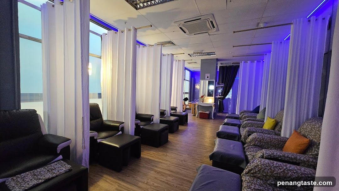 Interior Lounge Area with Seating and Curtains