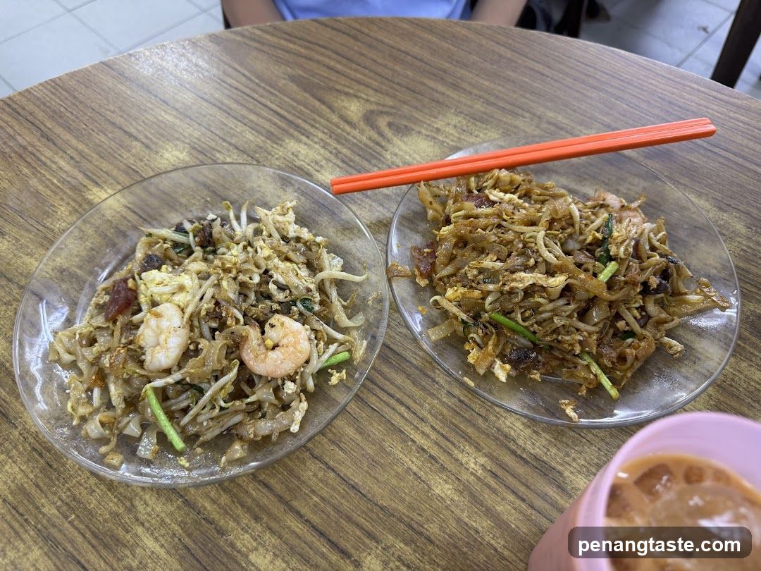 Nasi Lemak and Fried Rice on Wooden Table