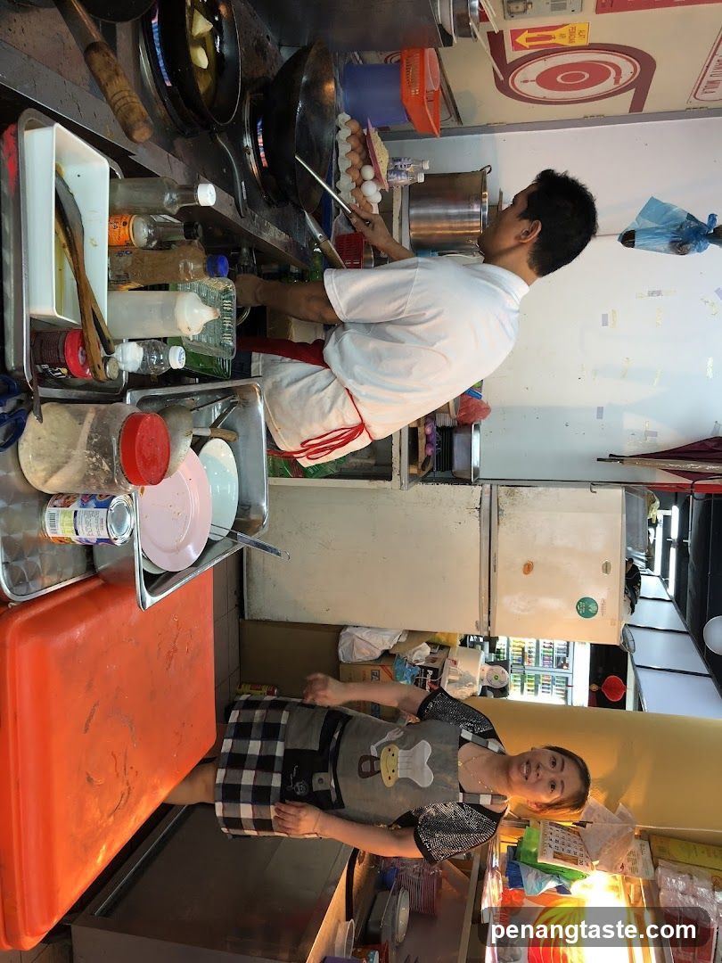 Kitchen Interior with Staff Cooking
