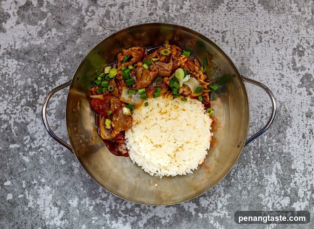 Stir-fried Meat with Rice in Metal Bowl