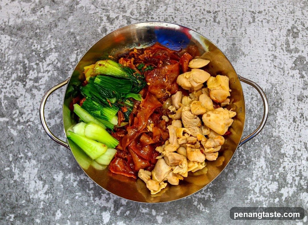 Stir-fried Noodles with Chicken and Greens