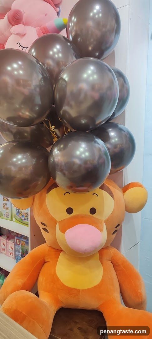 Tigger plush with balloons
